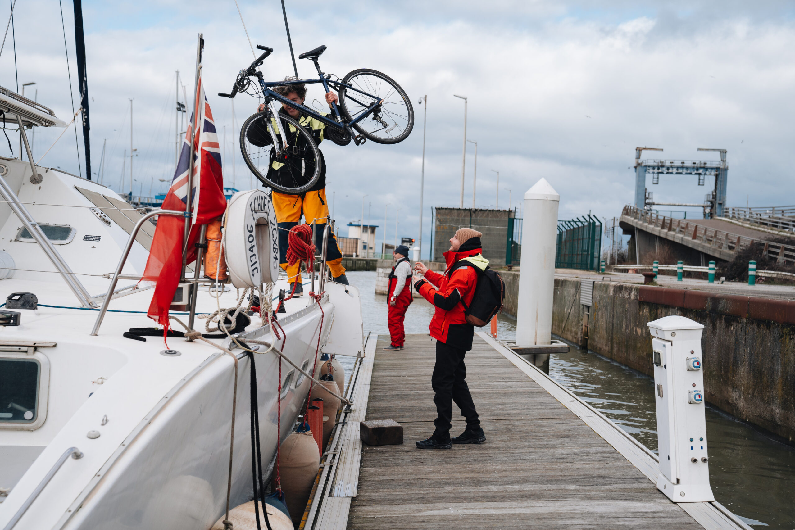 Loading bicycle onto SailLink catamaran at Dover Marina, London to Paris by bike