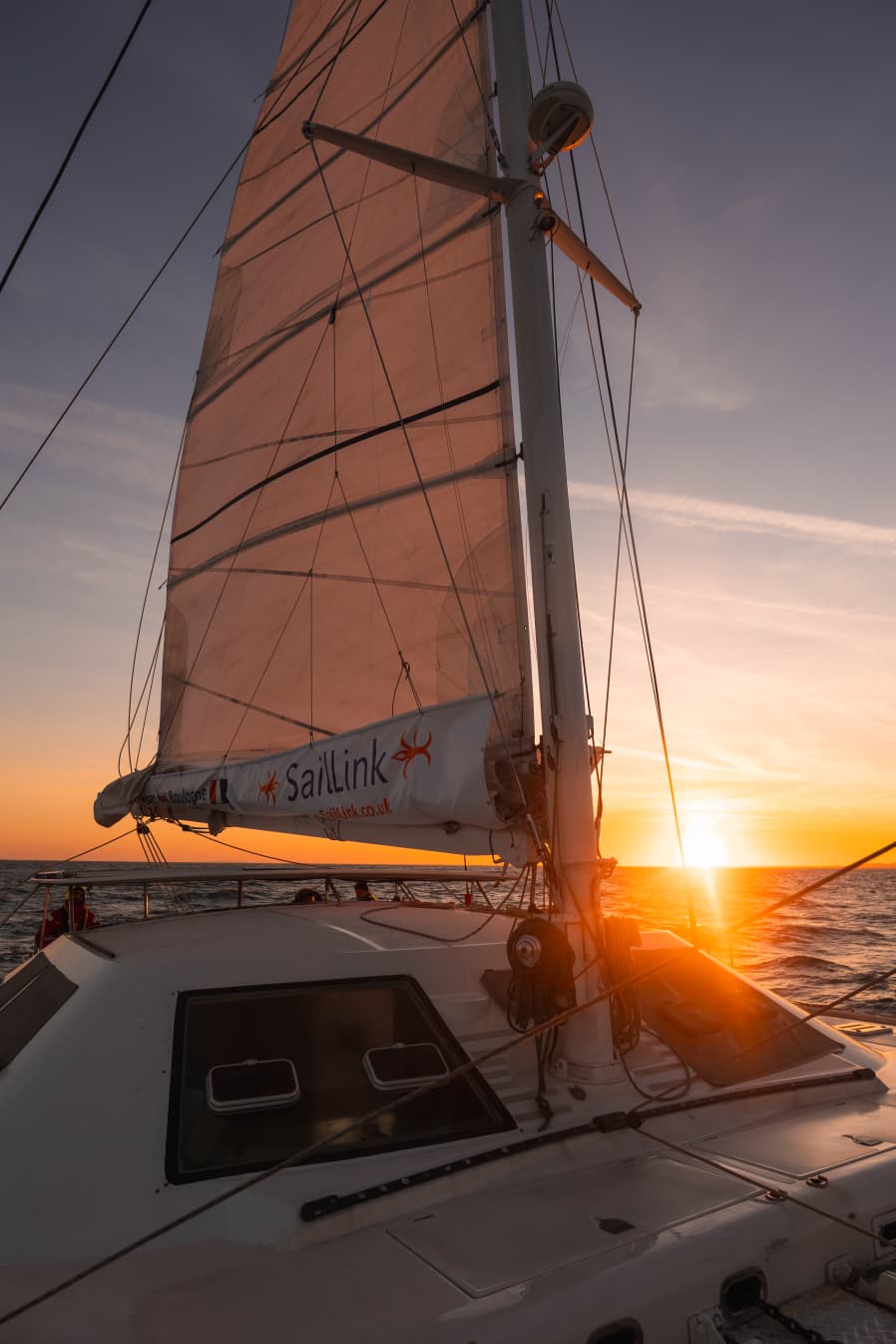 Sunset view from SailLink catamaran crossing the English Channel